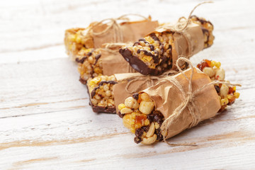 Granola bar on wooden background