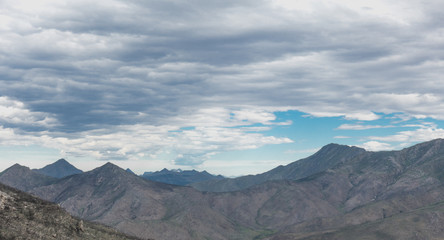 overlapping burnt mountains