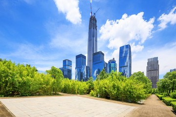 Fototapeta premium road of a modern city with skyscrapers as background