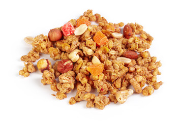 Granola with dried fruits isolated on white