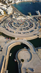 Aerial drone bird's eye view photo of public new small port built for yachts in chora of Mykonos island, Cyclades, Greece