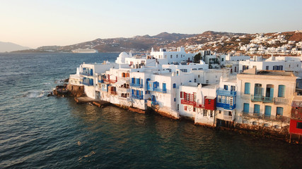 Fototapeta na wymiar Aerial drone, bird's eye view photo from iconic Little Venice at sunset with beautiful colours, Mykonos island, Cyclades, Greece