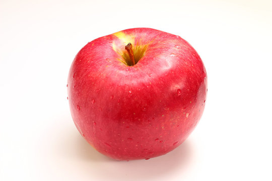 Red apple of Aidarid variety on a white background