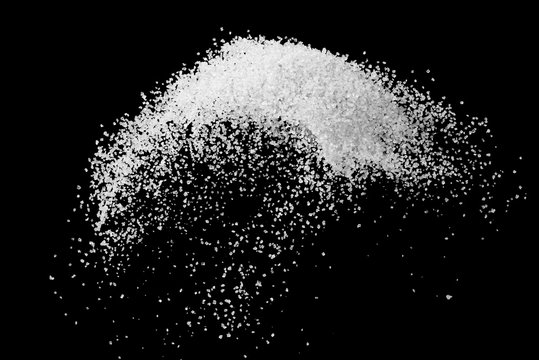 White sugar splash explode isolated on black background  ,throwing freeze stop motion element food and drink object design