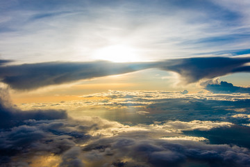 cloud on the blue sky and sun flare back cloud