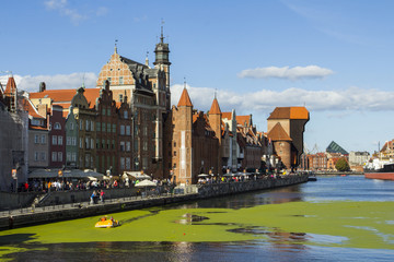 Obraz premium Ancient colored houses on the promenade of the river in Gdansk. Poland