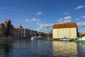 Fototapeta na wymiar Historic buildings on the banks of the river in Gdansk. Poland