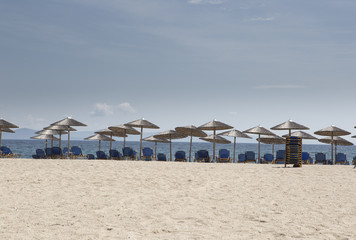 beutiful sand beach with sun-beds