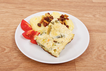 Baked leek with mashed potatoes on a table