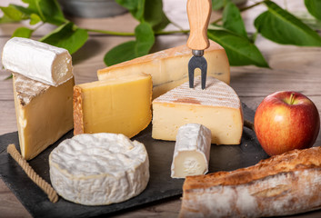 platter of different french cheeses