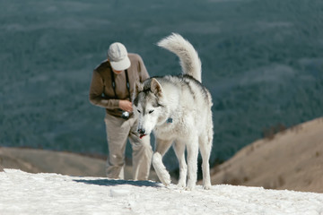 Tourists climb to the top of the Caucasus Mountains, Thach