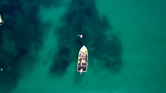  Boats Floating On Turquoise Water in Tossa de Mar, Spain