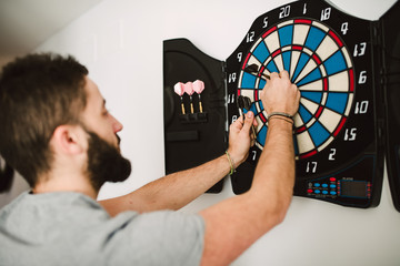 Man playing darts