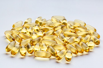 Omega- 3 fish oil capsules. Closeup macro view.