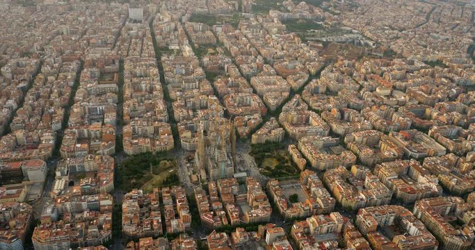Aerial view of Barcelona Eixample district and Sagrada Familia Basilica, Spain