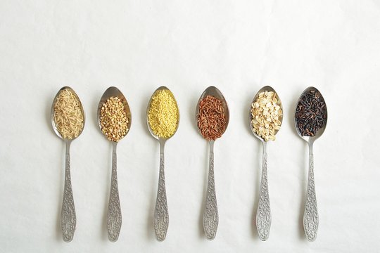 gluten-free grain on a metal spoon