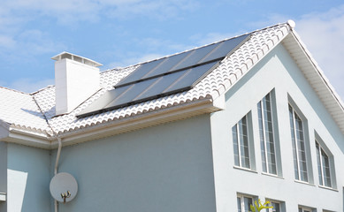 Modern House with Energy Efficiency Solution Concept Roof.  House  with Solar Energy, Solar Panels
