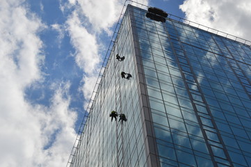 Window washer at skyscraper