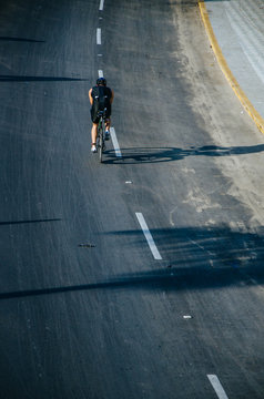 Cyclist on the road at full speed