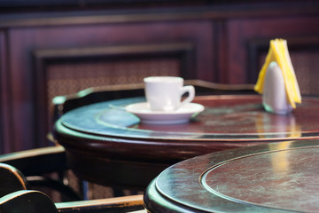 Obraz na płótnie Canvas Coffee on a round wooden table