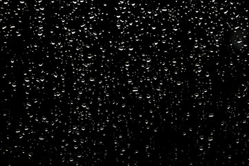 Drops of rain on dark glass. Background for design and creativity_