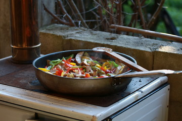 Close up of pepperoni cooking