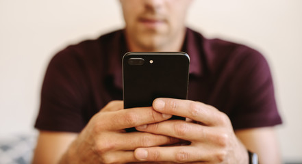 Man looking at mobile phone