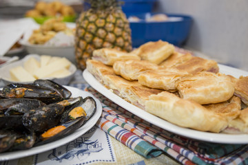 close-up of bandit table with mixed appetizers