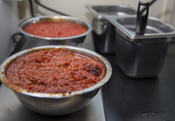 horizontal image of close-up of fresh tomato sauce for pasta seasoning