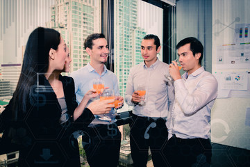 Youngs business people are celebrating success.