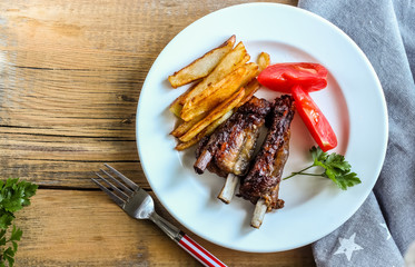 grilled pork ribs with french fries