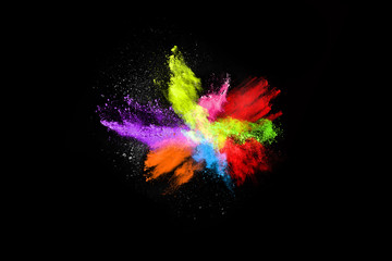 Multicolor powder explosion on black background. 