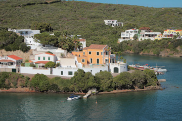 Fototapeta premium Sea gulf and country houses ashore. Mahon, Menorca, Spain