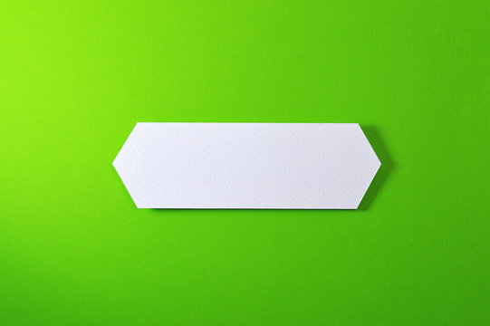 double arrow banner on green background