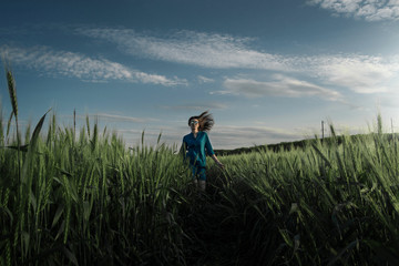 Girl running in the field