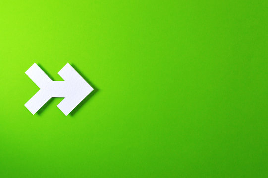 one arrow on green background