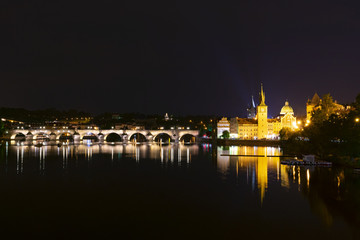 Obraz premium Czech Republic, view of Prague at night, Charles Bridge and Prague Castle in the light of street lamps