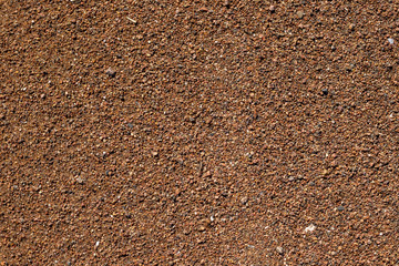 Sea pebbles. Small stones gravel texture background. Gravel Stones. Brown small pebbles pattern