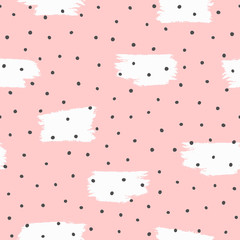Repeated irregular polka dot and brush strokes painted with rough brush. Seamless pattern drawn by hand.