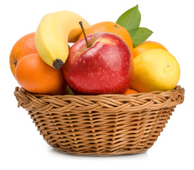 Fruit in basket isolated on white
