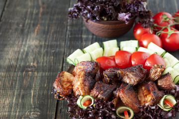 Pork ribs, grilled with fresh vegetables