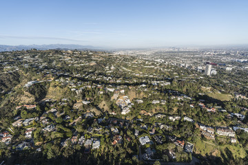 Aerial view of hillside and canyon homes above Beverly Hills, West Hollywood and Los Angeles in...