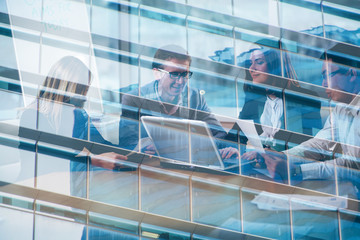 Businessmen that work together in office. Concept of teamwork and partnership. double exposure