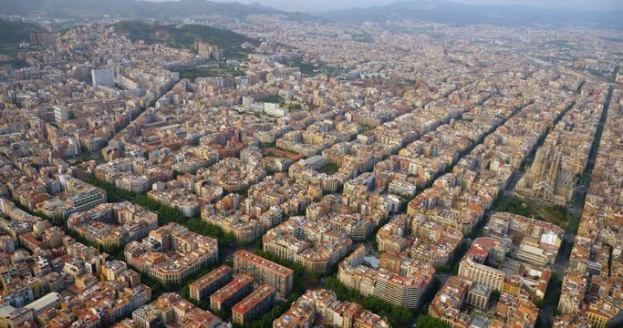Aerial view of Barcelona Eixample residential district with famous urban grid, Spain