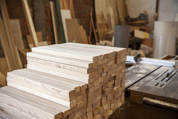 wooden panels stacked in a pile