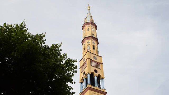 Turin, Piedmont region, Italy. May 2018. Church of Our Lady of Suffrage and Santa Zita. Its bell tower, with its 83 meters, is the fifth highest summit of the city of Turin. Horizontal movement.