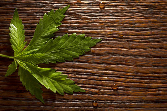 A hemp sheet on a Brown wooden background