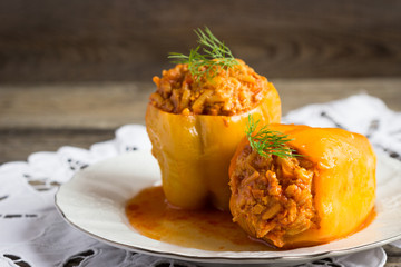 Stuffed peppers on a white plate.