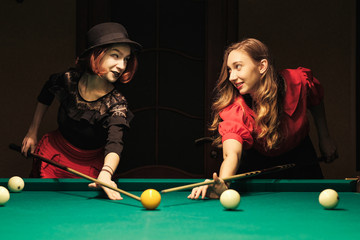 Fototapeta premium girl in the billiard room