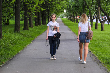 young girl walking in the park